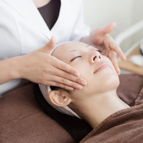 Japanese women receiving facial care Japanese women receiving facial care